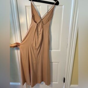 The reformation beige backless dress with slit